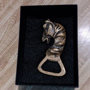 Antique bottle opener horse design
